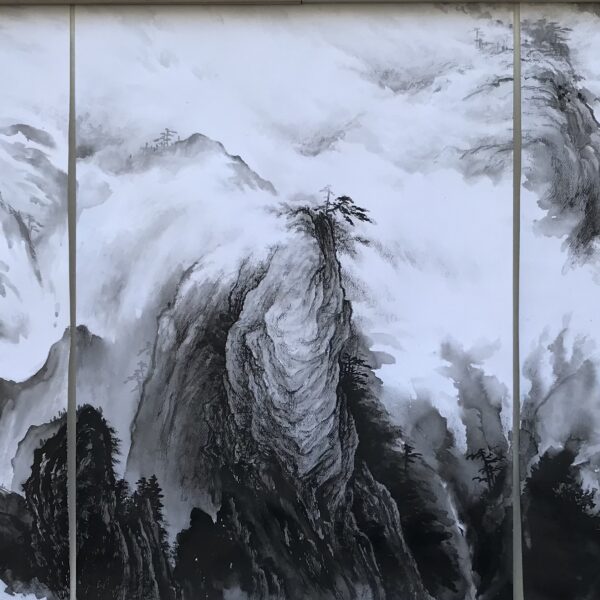 Ink-Wash Peaks: Where Clouds Embrace the Mountains